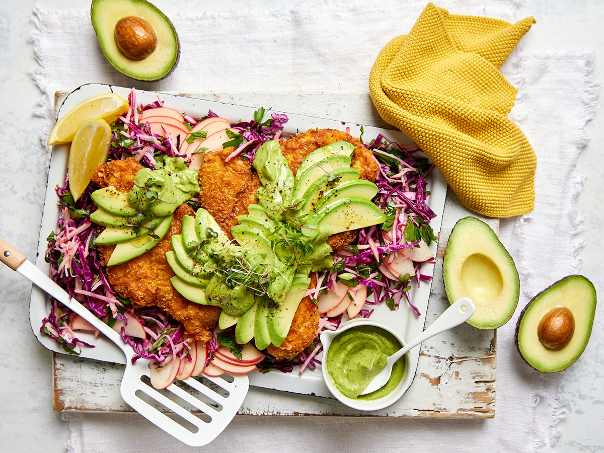 Cornflake crumbed chicken schnitzel with avocado