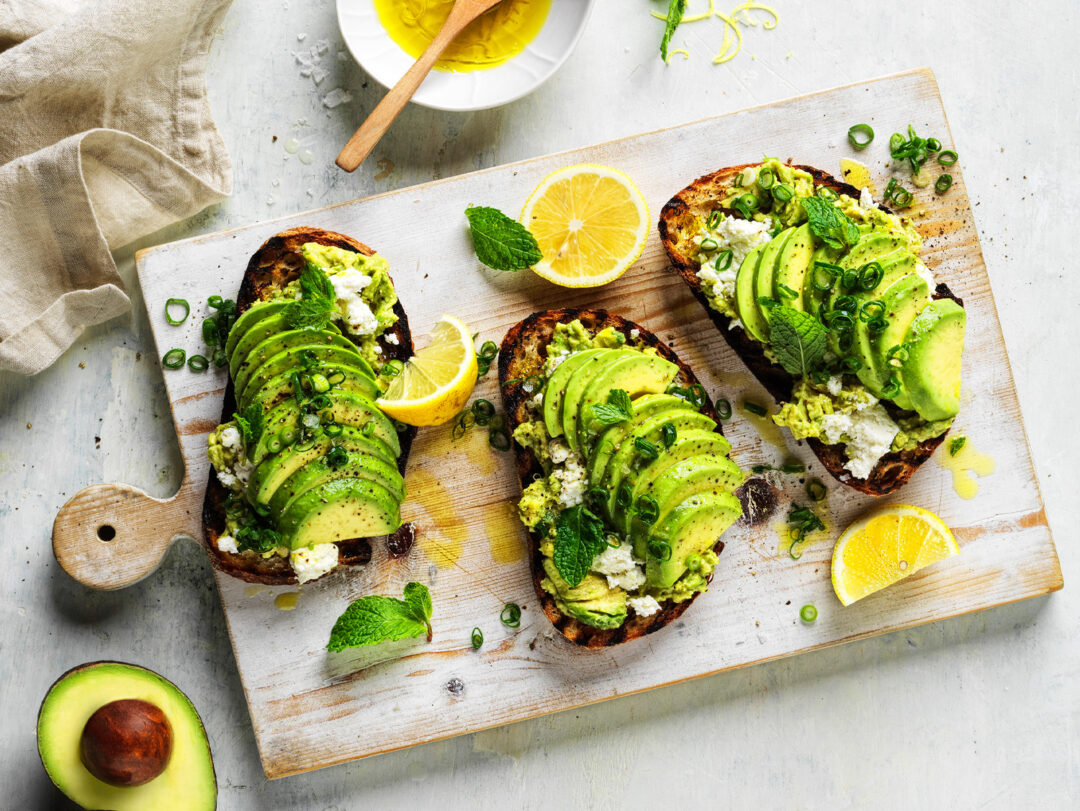 Crushed avocado on grilled sourdough with mint and ricotta Australian