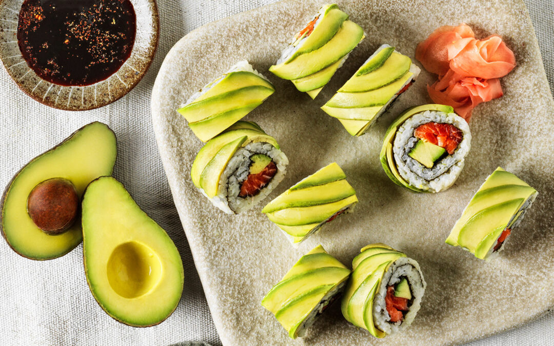 Avocado and salmon inside out sushi rolls