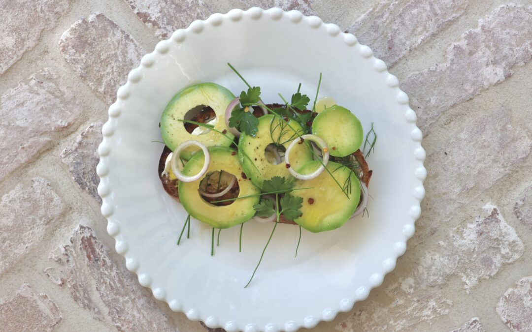 Avocado Rounds with Ricotta, Soft Herbs, Pickled Shallot & Chilli Honey