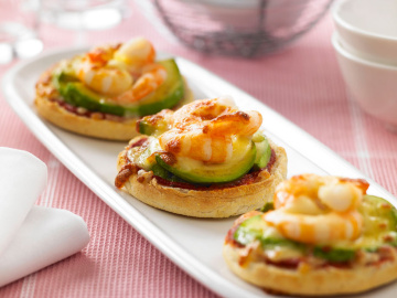 Mini prawn and avocado muffin pizzas